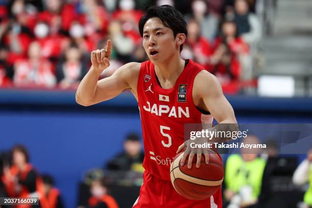 Yuki Kawamura of Japan dribbles the ba during the FIBA Basketball Asia Cup qualifier Group C game between Japan and China at Ariake Coliseum on...