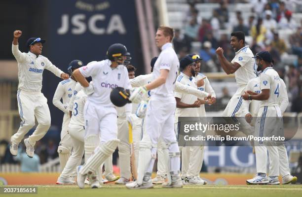 Yashasvi Jaiswal and Ravichandran Ashwin leap as a review confirms Joe Root is dismissed during day three of the 4th Test Match between India and...