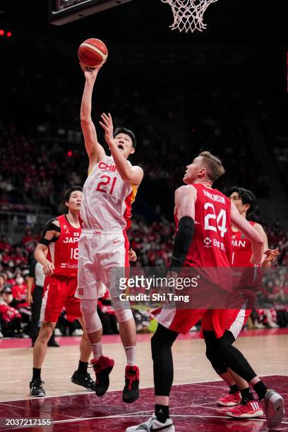 Jinqiu Hu of China shoots during the FIBA Asia Cup qualifier Group C game between Japan and China at Ariake Coliseum on February 25, 2024 in Tokyo,...