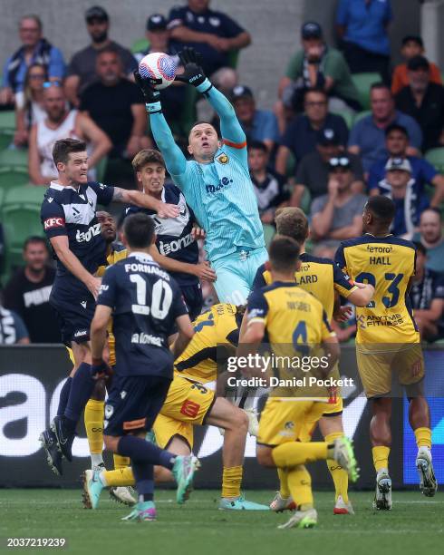 Mariners goalkeeper Daniel Vukovic makes a save during the A-League Men round 18 match between Melbourne Victory and Central Coast Mariners at AAMI...