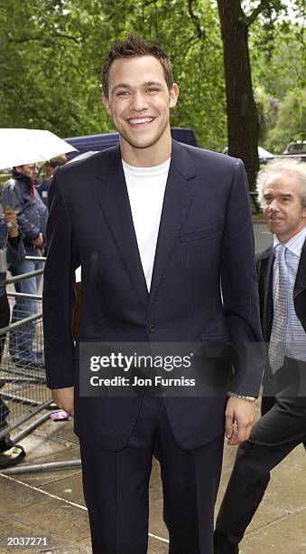 British Pop Idol winner Will Young arrives at the Ivor Novello Awards at the Grosvenor House Hotel in London on May 23, 2002. The IVORS honour the...