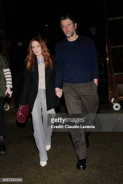 Julianne Moore and Bart Freundlich attend the Bottega Veneta Winter 24 Show on February 24, 2024 in Milan, Italy.