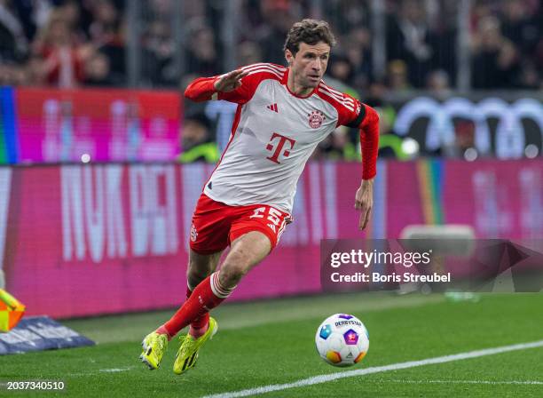 Thomas Mueller of FC Bayern Muenchen runs with the ball during the Bundesliga match between FC Bayern München and RB Leipzig at Allianz Arena on...