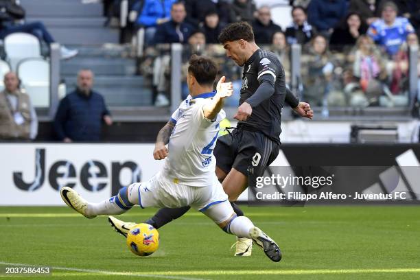 Dusan Vlahovic of Juventus scores his team's first goal during the Serie A TIM match between Juventus and Frosinone Calcio at Allianz Stadium on...