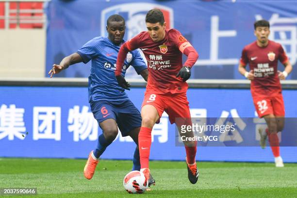 Oscar of Shanghai Port drives the ball during the 2024 Chinese Football Association Super Cup between Shanghai Port and Shanghai Shenhua at Hongkou...