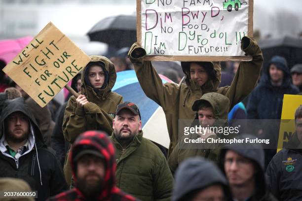 Protesters holding placards gather outside the Senedd on February 28, 2024 in Cardiff, Wales. Following peaceful demonstrations in Wrexham, Rhyl, Old...