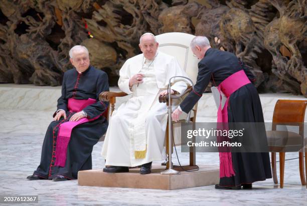 Pope Francis is delivering his speech during his weekly general audience in the Paul VI Hall at the Vatican, on February 28, 2024.