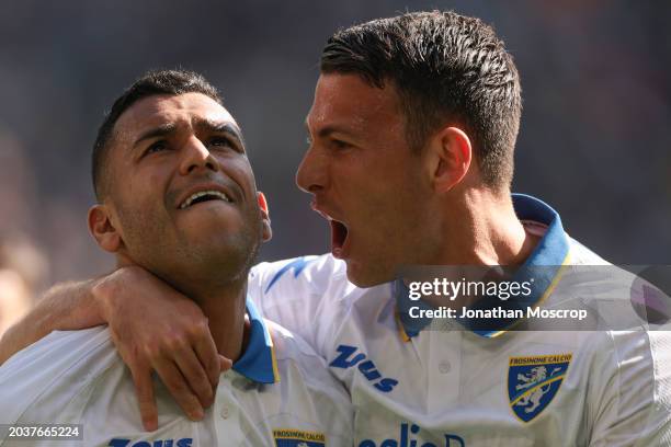 Walid Cheddira of Frosinone Calcio celebrates with team mate Luca Mazzitelli after scoring to level the game at 1-1 during the Serie A TIM match...