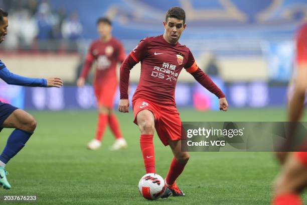 Oscar of Shanghai Port drives the ball during the 2024 Chinese Football Association Super Cup between Shanghai Port and Shanghai Shenhua at Hongkou...