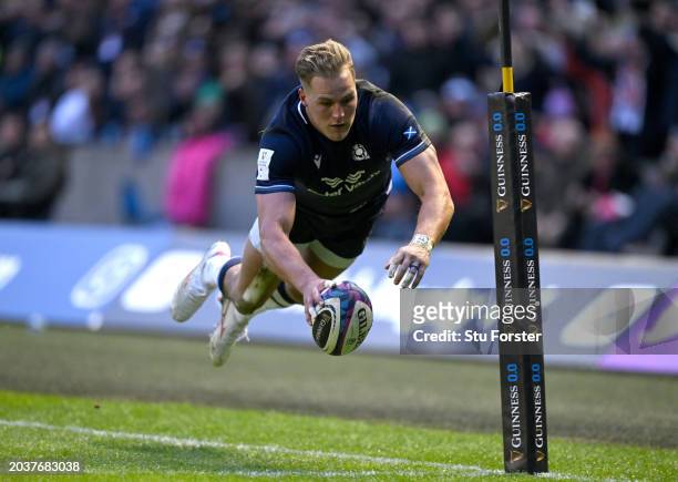 Scotland wing Duhan van der Merwe dives to score the second Scotland try during the Guinness Six Nations 2024 match between Scotland and England at...