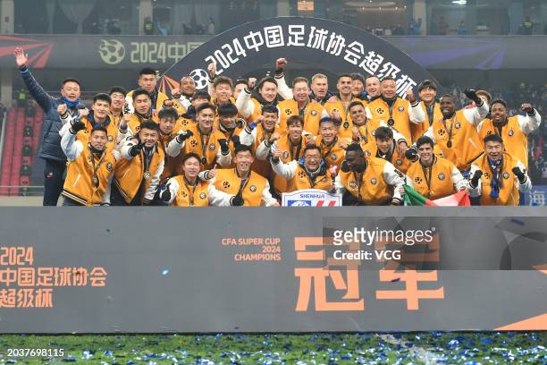 Players of Shanghai Shenhua celebrate after winning the 2024 Chinese Football Association Super Cup against Shanghai Port at Hongkou Football Stadium...