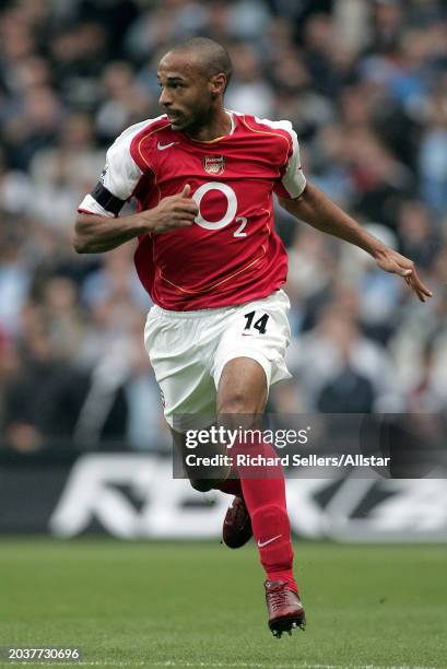 Thierry Henry of Arsenal running during the Premier League match between Manchester City and Arsenal at City Of Manchester Stadium on September 25,...