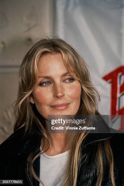 American actress Bo Derek attends a ceremony where she presented the swimsuit she wore in her movie '10', at Planet Hollywood in Santa Ana,...