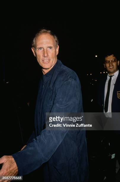American actor Bruce Dern, wearing a blue jacket over a blue shirt, attends the West Hollywood premiere of 'After Dark, My Sweet', held at the...