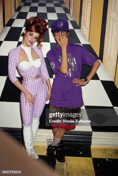 American singer, songwriter and DJ Lady Miss Kier, in a white-and-lilac checked outfit with a keyhole neckline and white knee-high boots, and...