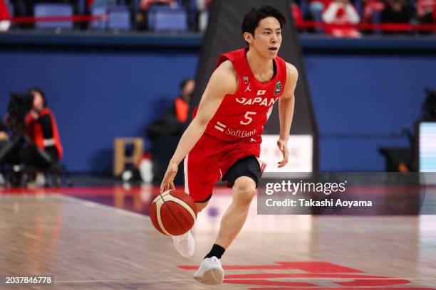 Yuki Kawamura of Japan drives to the baske during the FIBA Basketball Asia Cup qualifier Group C game between Japan and China at Ariake Coliseum on...