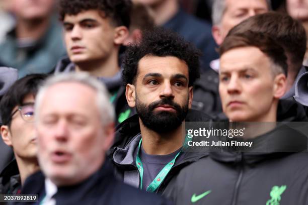 Mohamed Salah of Liverpool looks on from the substitutes bench prior to the Carabao Cup Final match between Chelsea and Liverpool at Wembley Stadium...
