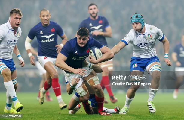 Paul Boudehent of France is tackled by Martin Page-Relo of Italy during the Guinness Six Nations 2024 match between France and Italy at Stade Pierre...