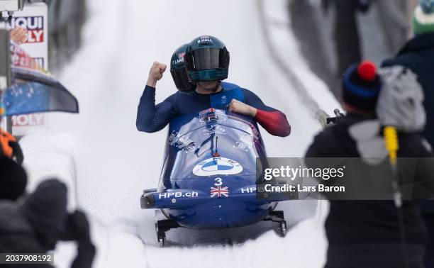 Brad Hall and Taylor Lawrence of Great Britain celebrates after their final round of the 2-man Bobsleigh competition at the BMW IBSF Bobsleigh And...