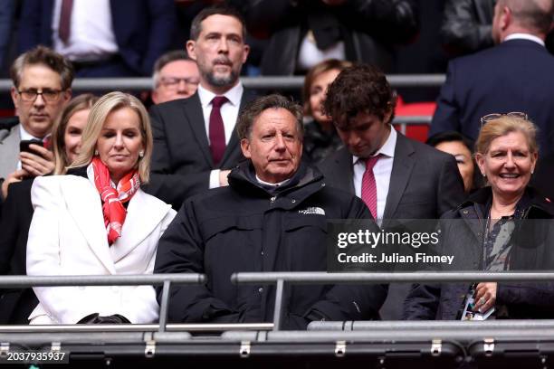 Tom Werner, Chairman of Liverpool, and partner, Jennifer Ashton, look on from the stands prior to the Carabao Cup Final match between Chelsea and...