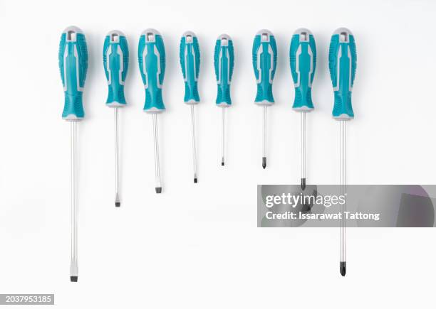 realistic screwdrivers set isolated on white background. hand tools for repair and construction. small and large, crosshead and flathead phillips screwdrivers, - realistic illustration stock pictures, royalty-free photos & images