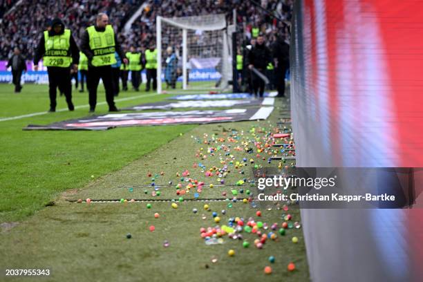 Detailed shot of objects which have been thrown in protest to investment in the German League during the Bundesliga match between Eintracht Frankfurt...