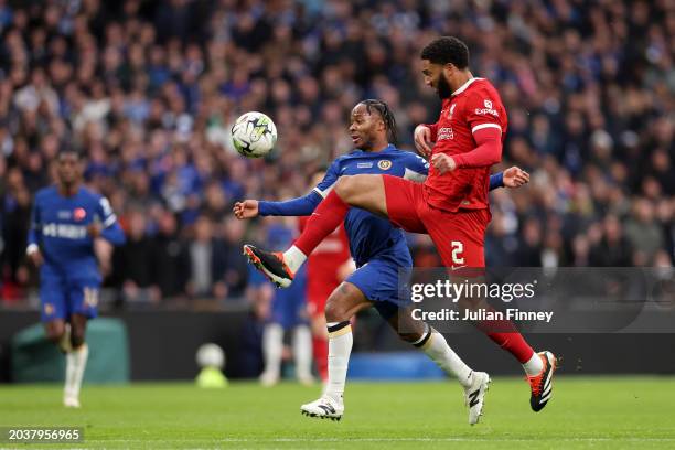 Raheem Sterling of Chelsea is challenged by Joe Gomez of Liverpool during the Carabao Cup Final match between Chelsea and Liverpool at Wembley...