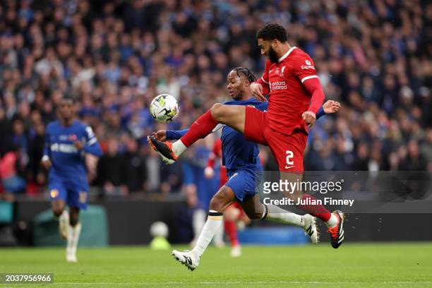 Raheem Sterling of Chelsea is challenged by Joe Gomez of Liverpool during the Carabao Cup Final match between Chelsea and Liverpool at Wembley...