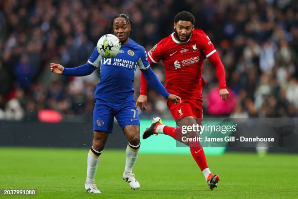 Raheem Sterling of Chelsea battles for possession with Joe Gomez of Liverpool during the Carabao Cup Final match between Chelsea and Liverpool at...