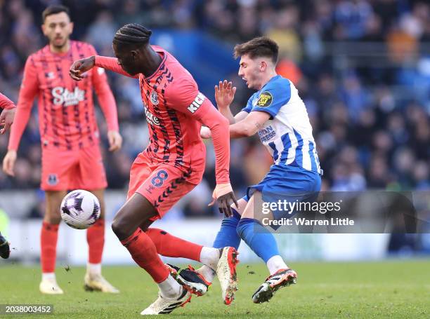 Billy Gilmour of Brighton fouls Amadou Onana of Everton resulting in a red card during the Premier League match between Brighton & Hove Albion and...