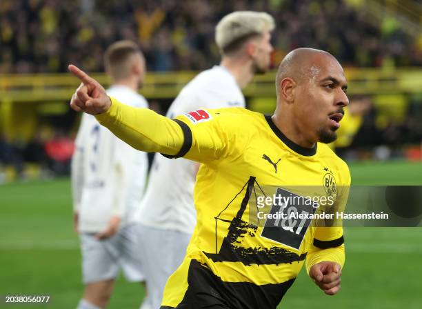Donyell Malen of Borussia Dortmund celebrates scoring his team's first goal during the Bundesliga match between Borussia Dortmund and TSG Hoffenheim...