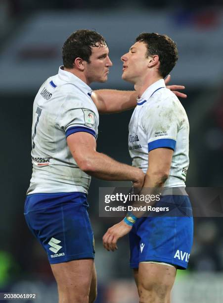 Michele Lamaro and Paolo Garbisi of Italy embrace at full-time following the team's draw in the Guinness Six Nations 2024 match between France and...