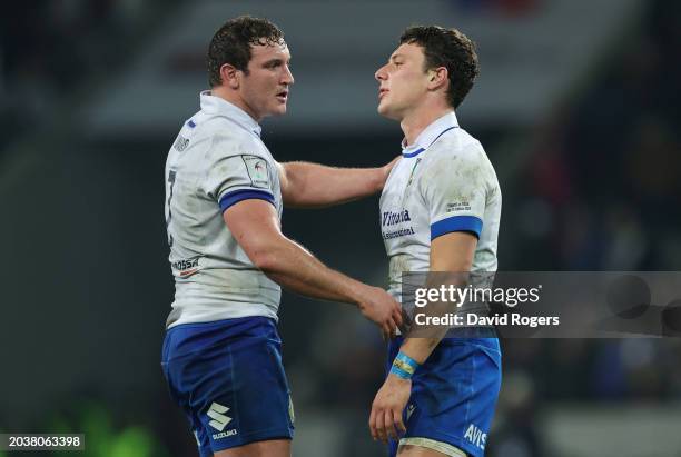 Paolo Garbisi of Italy is consoled by Michele Lamaro of Italy at full-time following the team's draw in the Guinness Six Nations 2024 match between...