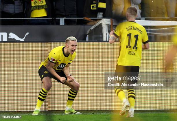 Nico Schlotterbeck of Borussia Dortmund celebrates scoring his team's second goal during the Bundesliga match between Borussia Dortmund and TSG...