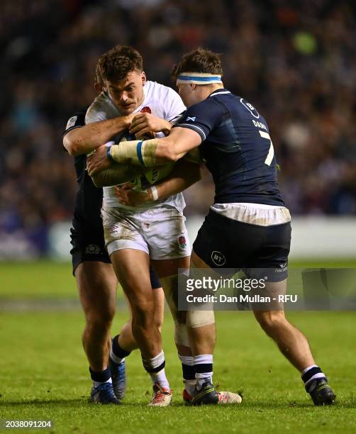 George Furbank of England is tackled by Alec Hepburn and Rory Darge of Scotland during the Guinness Six Nations 2024 match between Scotland and...