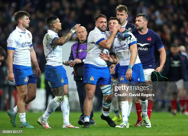 Paolo Garbisi of Italy is consoled by team mates after missing a last minute, match winning penalty during the Guinness Six Nations 2024 match...