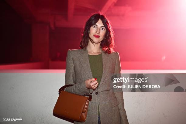 French designer, creative director, model and founder of French fashion label Rouje, Jeanne Damas poses for a photocall ahead of the presentation of...