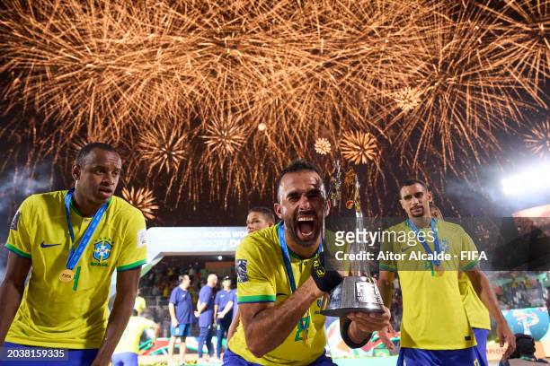 Bruno Xavier of Brazil lift the FIFA Beach Soccer World Cup UAE 2024 trophy during the FIFA Beach Soccer World Cup UAE 2024 Final match between...