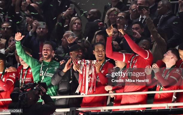Virgil van Dijk of Liverpool celebrates with the Carabao Cup trophy after their team's victory in the Carabao Cup Final match between Chelsea and...