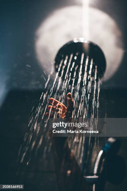 woman taking a shower at home. - woman using shower gel stock pictures, royalty-free photos & images