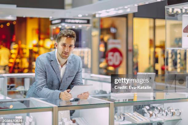 in the shopping mall - masculine stock pictures, royalty-free photos & images