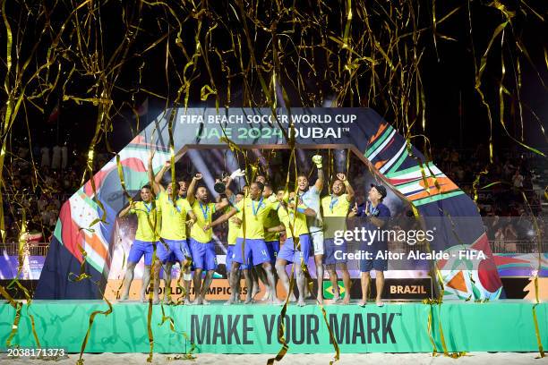 Players of Brazil lift the FIFA Beach Soccer World Cup UAE 2024 trop during the FIFA Beach Soccer World Cup UAE 2024 Final match between Brazil and...