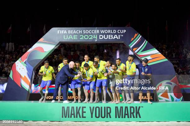 Players of Brazil lift the FIFA Beach Soccer World Cup UAE 2024 trophy during the FIFA Beach Soccer World Cup UAE 2024 Final match between Brazil and...