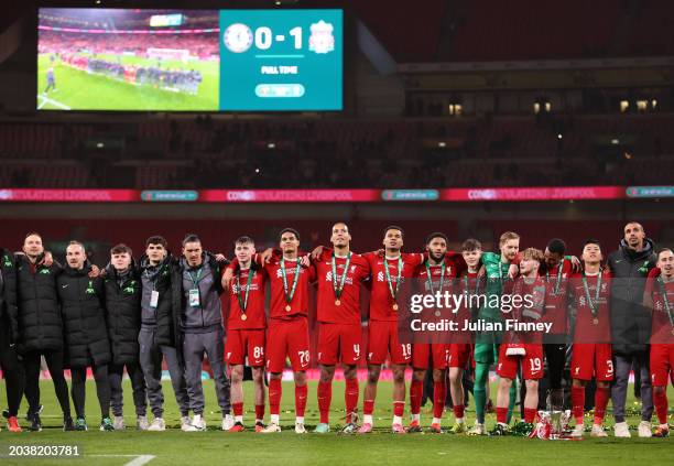 Conor Bradley, Jarell Quansah, Virgil van Dijk, Cody Gakpo, Joe Gomez, Caoimhin Kelleher, Harvey Elliott and Wataru Endo of Liverpool celebrate after...