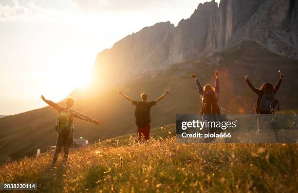 adventures on the dolomites: teenagers hiking - fassatal stock-fotos und bilder