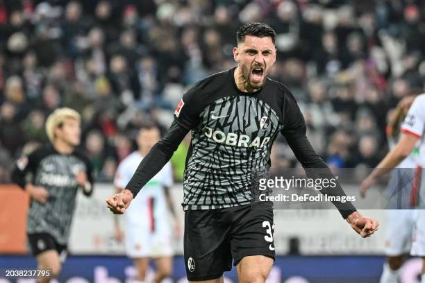 Vincenzo Grifo of SC Freiburg celebrates after scoring his team's first goal during the Bundesliga match between FC Augsburg and Sport-Club Freiburg...