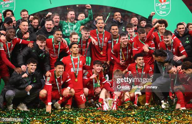 Virgil van Dijk of Liverpool celebrates with the Carabao Cup alongside team mates after the Carabao Cup Final match between Chelsea and Liverpool at...