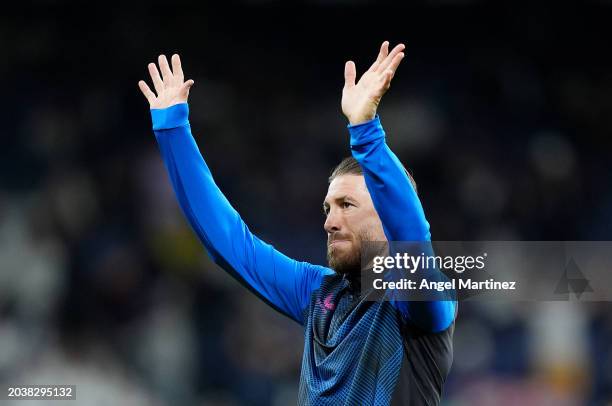 Sergio Ramos of Sevilla FC acknowledges the fans as he warms up prior to the LaLiga EA Sports match between Real Madrid CF and Sevilla FC at Estadio...