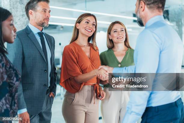 business people shaking hands in the office - recruiter stock pictures, royalty-free photos & images