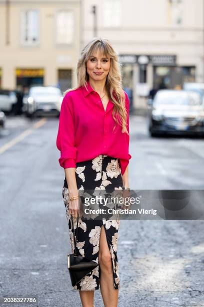 Ekaterina Mamaeva wears pink button shirt Saint Laurent, skirt with graphic print Rotate Birger Christensen, bag Saint Laurent, necklace & earrings...